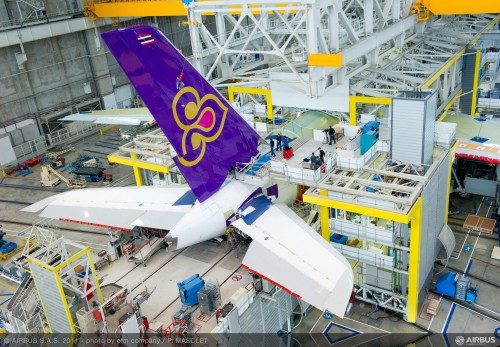 HI-RES PHOTO (click for larger). Final assembly of first THAI A380 begins. Assembly of the first A380 for Thai Airways International (THAI) various sections has now commenced at the Airbus Final Assembly Line in Toulouse. THAI will become the ninth operator of the A380 when it takes delivery of its first aircraft in the third quarter of 2012. The airline has firm orders for six A380s and will operate the aircraft on its premier routes from Bangkok to Europe. (23 November 2011 - by Airbus))