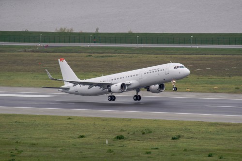 HI-RES IMAGE (click for larger): First Airbus A321 with Sharklets takes to the skies for the first time in Hamburg joining the on-going certification flight test campaign of the fuel saving large wing tip devices. Image from Airbus.