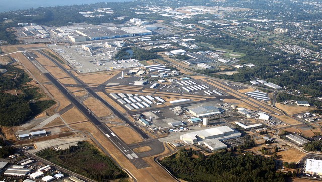 Boeing’s Everett Facility at Paine Field photographed from the air in 2009 with runway 16R/34L on the left side. Image Courtesy: Boeing