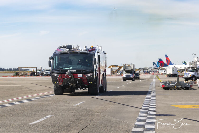 One of the SEA Airport fire trucks arriving at the gate for a water cannon salute