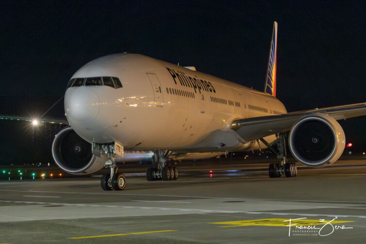 A Philippines Airlines 777 taxiing to the gate at SEA on it's inaugural visit