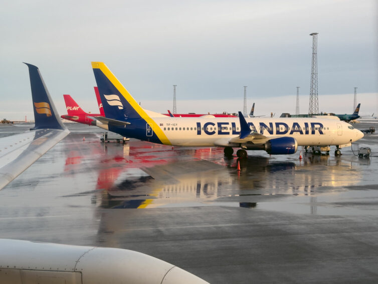 An Icelandair Boeing 737 MAX parked at a hard stand at Keflavik airport